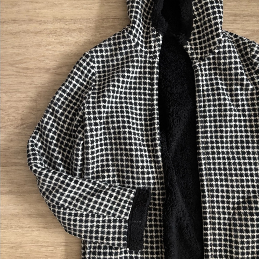 fluffy black and white hooded fleece jacket